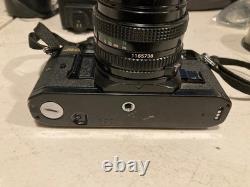 Canon A-1 35mm SLR Film Camera Black with 2X Lens, Bag, Flash & Accessories