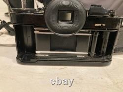 Canon A-1 35mm SLR Film Camera Black with 2X Lens, Bag, Flash & Accessories