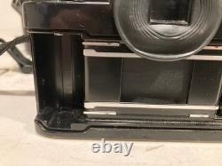 Canon A-1 35mm SLR Film Camera Black with 2X Lens, Bag, Flash & Accessories