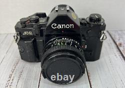 Canon A-1 A1 35mm SLR Film Camera with 50mm f/1.8 FD lens Kit