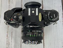 Canon A-1 A1 35mm SLR Film Camera with 50mm f/1.8 FD lens Kit