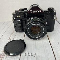 Canon A-1 A1 35mm SLR Film Camera with 50mm f/1.8 FD lens Kit