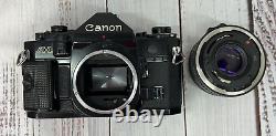 Canon A-1 A1 35mm SLR Film Camera with 50mm f/1.8 FD lens Kit