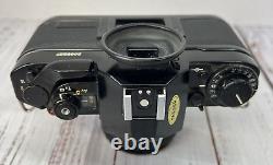 Canon A-1 A1 35mm SLR Film Camera with 50mm f/1.8 FD lens Kit