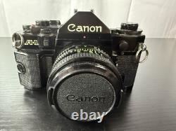 Canon A-1 Film Camera with 1.4 50mm Lens Manuals Cleaning Kit And Strap