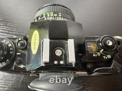 Canon A-1 Film Camera with 1.4 50mm Lens Manuals Cleaning Kit And Strap