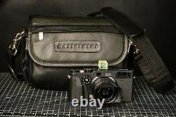 Hasselblad Xpan + 45/f4 lens + Original hood + Original leather bag