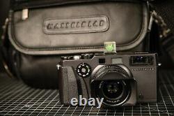 Hasselblad Xpan + 45/f4 lens + Original hood + Original leather bag