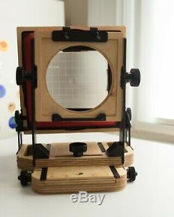 Intrepid 4x5 MkII camera, Nikkor-W 135mm 5.6 lens, fresnel, film holders, boards