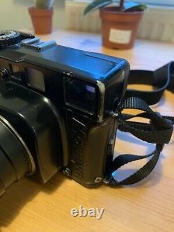 Mamiya 7 II rangefinder film camera, N 65mm F4 L lens, strap, hood. London UK