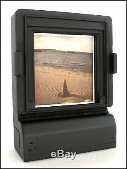 Mamiya Universal Press Pinhole Camera. Lens 0,2mm. Focal Length 40mm. F-Stop 200