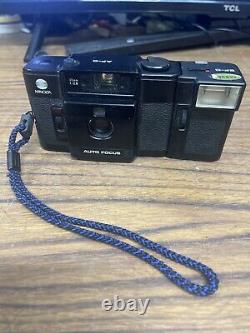 Minolta AF-C Auto Focus Film Camera, 35mm f/2.8 Lens with EF-C Flash