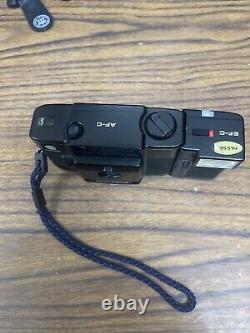 Minolta AF-C Auto Focus Film Camera, 35mm f/2.8 Lens with EF-C Flash