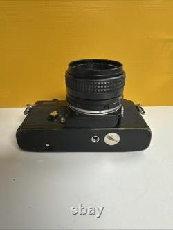 Minolta XE-7 SLR Film Camera with MC Rokkor-X PF 50mm 1.7 Lens