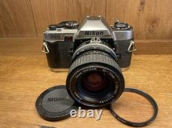 Near Mint Nikon FE10 Film Camera Ai-s Zoom Nikkor 35-70mm F/3.3-4.5 Lens