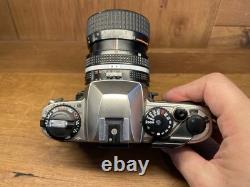 Near Mint Nikon FE10 Film Camera Ai-s Zoom Nikkor 35-70mm F/3.3-4.5 Lens