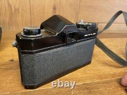 Near Mint Pentax Super Takumar 55mm F/1.8 Lens with Bonus SP Black Film Camera Near Mint Pentax Super Takumar 55mm F/1.8 Lens with Bonus SP Black Film Camera