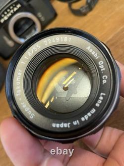 Near Mint Pentax Super Takumar 55mm F/1.8 Lens with Bonus SP Black Film Camera