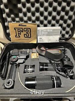 Nikon F3 SLR 35mm Film Camera with Lenses Case and Extras TESTED Working