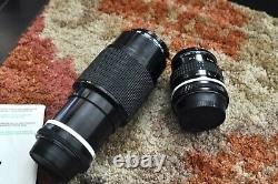 Nikon F3 camera body with two Nikon Nikkor lenses new batteries