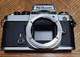 Nikon FE Silver 35mm Film Camera Body with Lenses And Flash Attachment