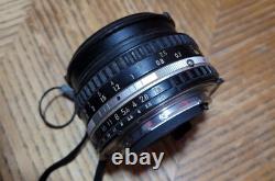 Nikon FE Silver 35mm Film Camera Body with Lenses And Flash Attachment