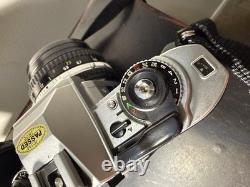 Nikon FG 35mm SLR Film Camera with Series E 50mm f/1.8 Lens Leather Case Manuals