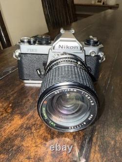 Nikon FM2 Silver 35mm SLR Film Camera with 35-105mm 13.54.3 Tokina Lens TESTED