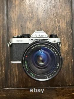 Nikon FM2 Silver 35mm SLR Film Camera with 35-105mm 13.54.3 Tokina Lens TESTED