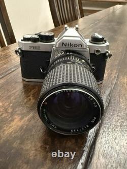 Nikon FM2 Silver 35mm SLR Film Camera with 35-105mm 13.54.3 Tokina Lens TESTED