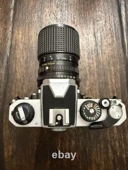 Nikon FM2 Silver 35mm SLR Film Camera with 35-105mm 13.54.3 Tokina Lens TESTED