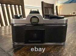Nikon FM2 Silver 35mm SLR Film Camera with 35-105mm 13.54.3 Tokina Lens TESTED