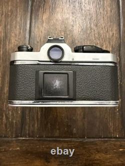 Nikon FM2 Silver 35mm SLR Film Camera with 35-105mm 13.54.3 Tokina Lens TESTED