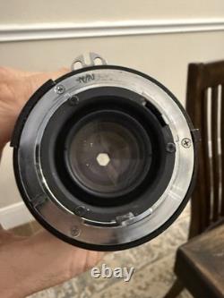Nikon FM2 Silver 35mm SLR Film Camera with 35-105mm 13.54.3 Tokina Lens TESTED