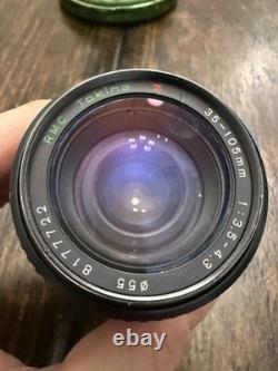 Nikon FM2 Silver 35mm SLR Film Camera with 35-105mm 13.54.3 Tokina Lens TESTED