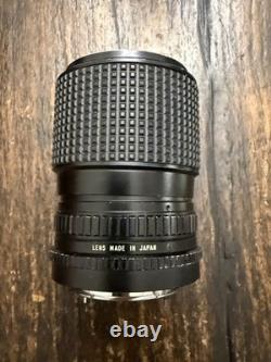 Nikon FM2 Silver 35mm SLR Film Camera with 35-105mm 13.54.3 Tokina Lens TESTED