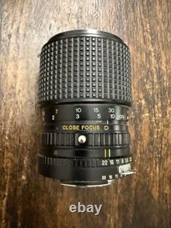 Nikon FM2 Silver 35mm SLR Film Camera with 35-105mm 13.54.3 Tokina Lens TESTED