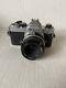 Nikon FM 35mm SLR Film Camera with NIKKOR 50mm 12 Lens Shutter Works