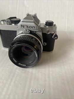 Nikon FM 35mm SLR Film Camera with NIKKOR 50mm 12 Lens Shutter Works