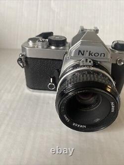 Nikon FM 35mm SLR Film Camera with NIKKOR 50mm 12 Lens Shutter Works