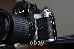 Nikon F 2 camera body with a lens and new batteries