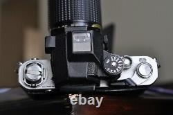 Nikon F 2 camera body with a lens and new batteries