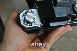 Nikon F 2 camera body with a lens and new batteries