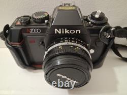 Nikon N2000 35mm SLR Film Camera NIKKOR 50mm 118 Accessories Lens Case