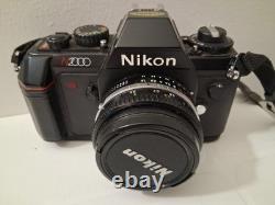 Nikon N2000 35mm SLR Film Camera NIKKOR 50mm 118 Accessories Lens Case