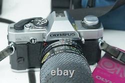 OLYMPUS OM20 OM-20 SLR FILM CAMERA WITH OLYMPUS 50mm 28-200mm LENSES