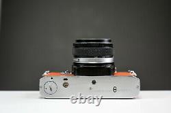 Olympus OM10 35mm Film Camera with 50mm f/1.8 Zuiko Lens Orange Leather Serviced
