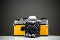 Olympus OM10 35mm Film Camera with 50mm f/1.8 Zuiko Lens Yellow Leather Serviced