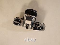 Olympus OM-10 35mm SLR Film Camera with 50 mm lens Kit