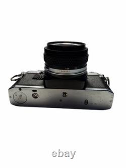 Olympus OM-10 35mm SLR Film Camera with 50 mm lens Kit TESTED AND WORKING